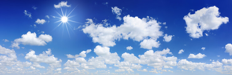 Naklejka na ściany i meble Blue sky, white clouds and shining sun