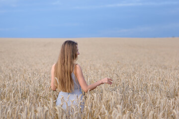 woman in wheat field 