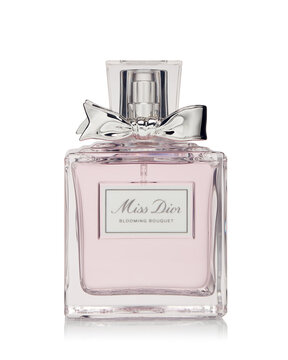 Bottle of perfume Miss Dior Blooming bouquet on white background. Christian Dior