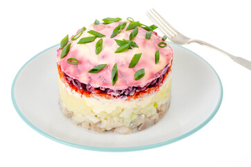 Portion puff vegetable salad with mayonnaise on white plate