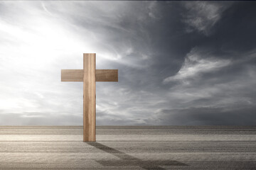 Christian cross on the wooden table