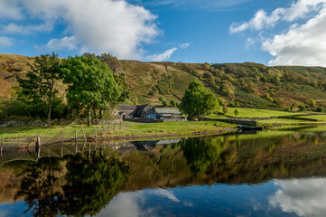 Fototapeta premium landscape with a lake and a house
