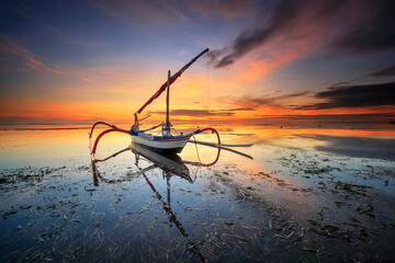 boat at sunrise in Sanur Bali