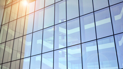 Modern office block with sunny beautiful sky. Bright outlook for business.