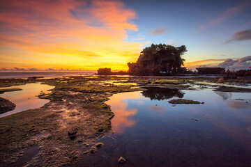 Tanah Lot Temple in sunset time, the most famous temple on the sea at Bali island, Indonesia