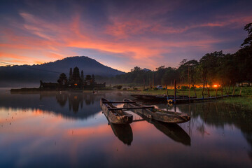 dramatic sunrise view at Tamblingan Lake Bali