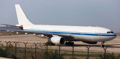 passenger plane lands at airport