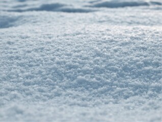 Obraz premium Textured white snow surface on a cold winter's day.