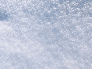 Lying white snow on the ground, natural background