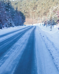 Obraz premium Winter forest. Winter road and everything in the snow.