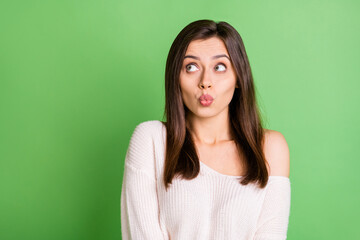Fototapeta premium Photo of young beautiful pretty lovely sweet cute girl pout lips look copyspace isolated on green color background