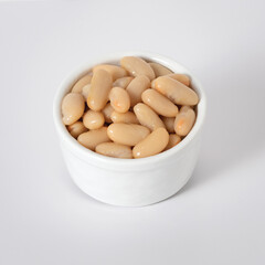 Cannellini beans from the lower Murgia Puglia in a white bowl