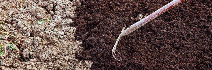 fresh digged soil and compost, a old rake in it