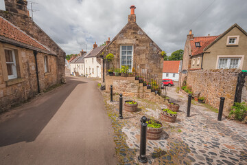 The quaint traditional village of Falkland, a popular filming location in Fife, Scotland on a sunny...