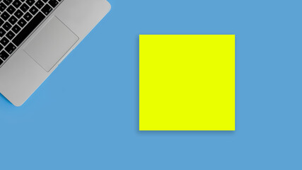 One blank sheet of yellow color on a blue background. Notebook.