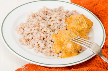 Pearl barley with meat balls. Studio Photo