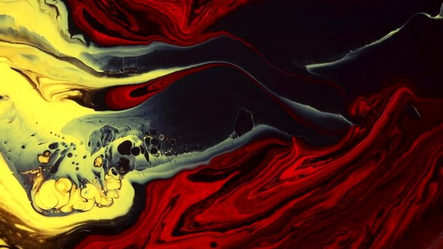 Fluid art painting video, modern acryl texture with flowing effect. Liquid paint mixing artwork with splash and swirl. Detailed background motion with red, black and yellow overflowing colors