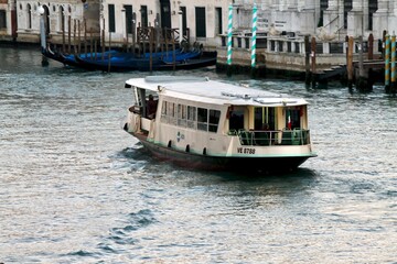 A view on a vaporetto boat in the Grand Canal in Venice - obrazy, fototapety, plakaty