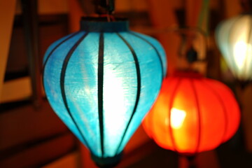 Night view of Colourful cloth lanterns lamp light shades hanging outside - ランタン 明かり 夜景