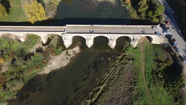 Aerial view of Nineteenth-century bridge over the Yantra River, known as the Kolyu Ficheto Bridge in Byala, Ruse region, Bulgaria