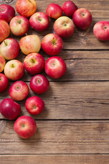 red apples on old wooden background