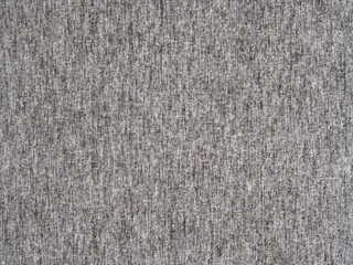 Light gray speckled fabric texture of blinds, the concept of the background on the site