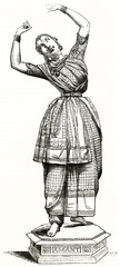 statuette reproduction of Amani, Indian Bayadere, in dancing pose arms up and bust little side flected. Ancient grey tone etching style art by Barre, Magasin Pittoresque, 1838