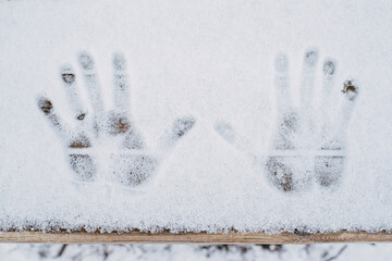 hands in snow