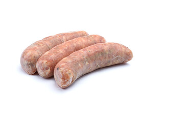 Raw pork sausages. Grilled sausages, spices close-up, isolated on a white background.Selective focus.