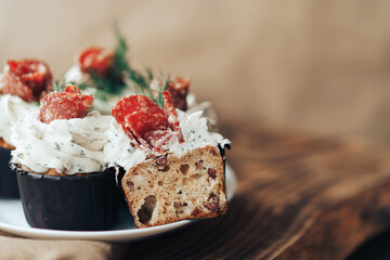 Delicious salty snack made from bread, sausage and cheese on a plate. Snack for alcoholic beverages and for a snack at a party.