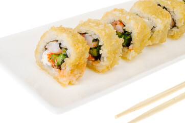 Warm prawn rolls isolated on white plate.