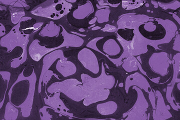 Pink and purple marble ink texture on watercolor paper background. Marble stone image. Bath bomb effect. Psychedelic biomorphic art.