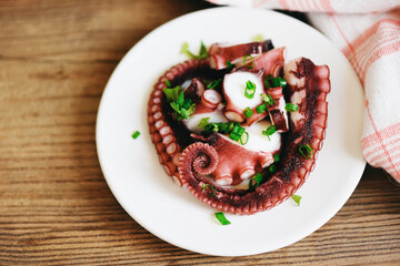 Octopus salad with herb vegetables, Fresh and healthy salad seafood squid octopus tentacles.