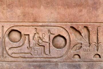 A wall carving with hieroglyphs Nisw-biti, Usermaatre Setepenre - King of Upper and Lower Egypt Ramesses the Second, Karnak Temple