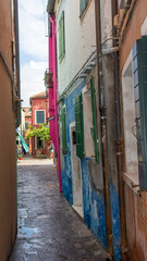 Fototapeta premium discovery of the city of Venice, Burano and its small canals and romantic alleys