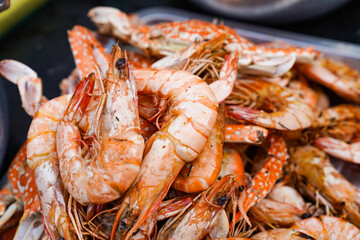 Close up to the Roasted shrimp on the top of pile.
