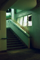 Vertical shot of stairs leading to the street from an underpass