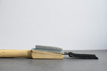 Wooden shoe brush. You can use a brush to loosen the sole of your dance shoe to increase the...