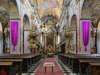 Fototapeta na wymiar Interior of Church of the Assumption of the Virgin Mary, also known as Jesuit Church, in Brno, Czech Republic. The church was built in 1598-1602 and modified in the 17th and 18th centuries.