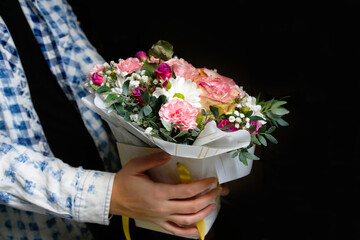 Defocus Man flowers. Close up of box with pink roses in male hands. Male give bouquet for mother's day, valentines, women day, birthday. Out of focus