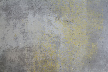 shabby concrete wall with spots of paint