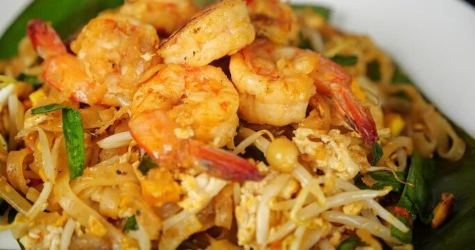 Thai traditional food, Shrimp Pad Thai, dry noodle, street food, Thai food style. Close up