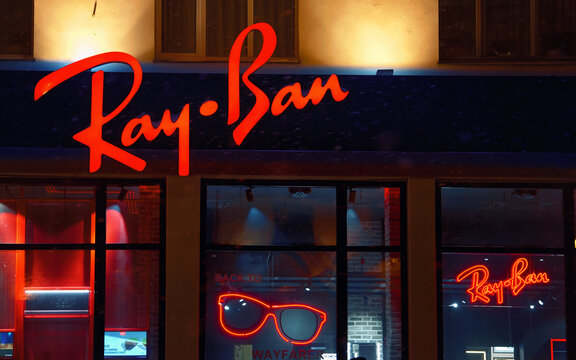 Minsk, Belarus. Feb 2021. Ray-ban logo on sunglasses branding shop on Nezavisimosti avenue 74. Ray-ban sign, sunglasses logo store in shop front