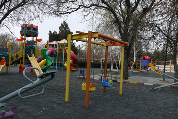 swings and sledges in playground, children's playground,