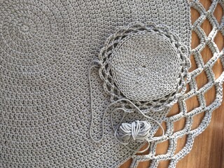 Fototapeta premium Knitting workshop with a hand-made table cloth.