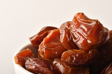dates fruit , famous for it in the regions of [Al-Qatif, Al-Qassim, Al-Kharj and Al-Hasa] in Saudi Arabia. It is characterized by preserving its good flavor after a long period of storage.