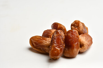 dates fruit , famous for it in the regions of [Al-Qatif, Al-Qassim, Al-Kharj and Al-Hasa] in Saudi Arabia. It is characterized by preserving its good flavor after a long period of storage.