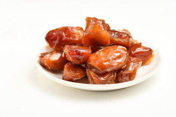 dates fruit , famous for it in the regions of [Al-Qatif, Al-Qassim, Al-Kharj and Al-Hasa] in Saudi Arabia. It is characterized by preserving its good flavor after a long period of storage.