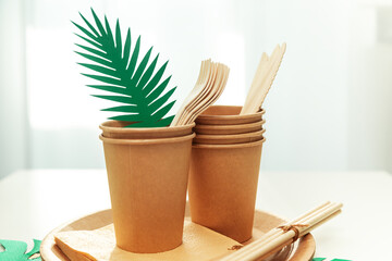 Natural eco-friendly bamboo and paper tableware. Recycling concept.