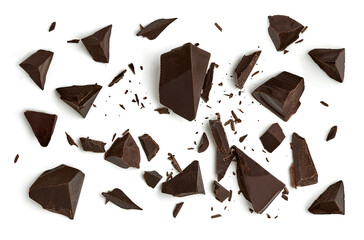 Broken, cracked or crushed dark chocolate parts from top view isolated on white background	